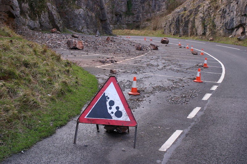 Rock fall into highway
