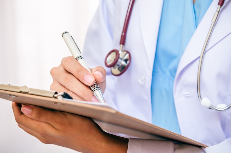 Doctor writing